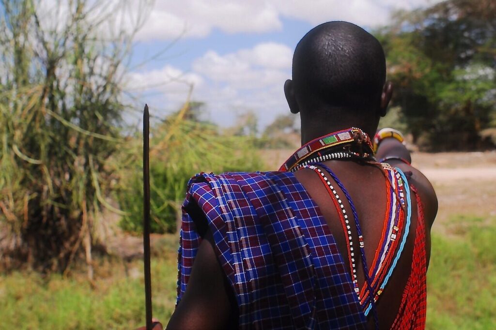 Maasai warriors in traditional dress near Amboseli National Park